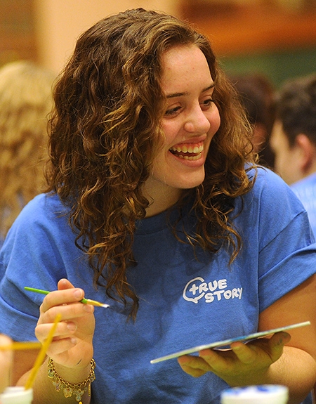 Catholic Youth Board member Maria Fontaine, 17, prepares for the weekend. (Dan Cappellazzo/Staff Photographer)